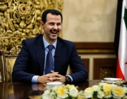 In welke stad staat het presidentiële paleis van Assad waar na zijn vlucht flink gefeest werd door veel blije Syriërs (8)