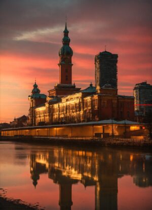 Wat werd in 1609 door de VOC aan het Damrak opgericht (5.3.9) letters 