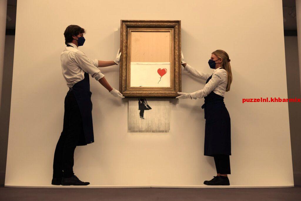 Britse maker van streetart wiens werk op een veiling door de shredder ging. (6)