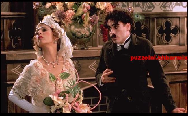 Wie speelt de rol van Charlie Chaplin in de film Chaplin uit 1992 (12) letters