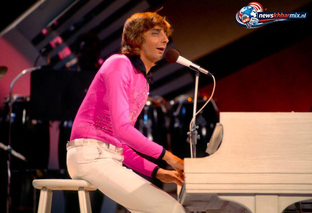 Wat is de achternaam van de zanger die een hit had met het lied 'Mandy' (7)